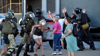Riot police detain protesters during a rally of opposition supporters in Minsk.