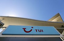 The sign above a branch of a Tui store in London, Thursday, July 30, 2020. 