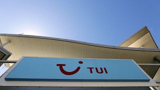 The sign above a branch of a Tui store in London, Thursday, July 30, 2020.