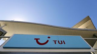 The sign above a branch of a Tui store in London, Thursday, July 30, 2020. 