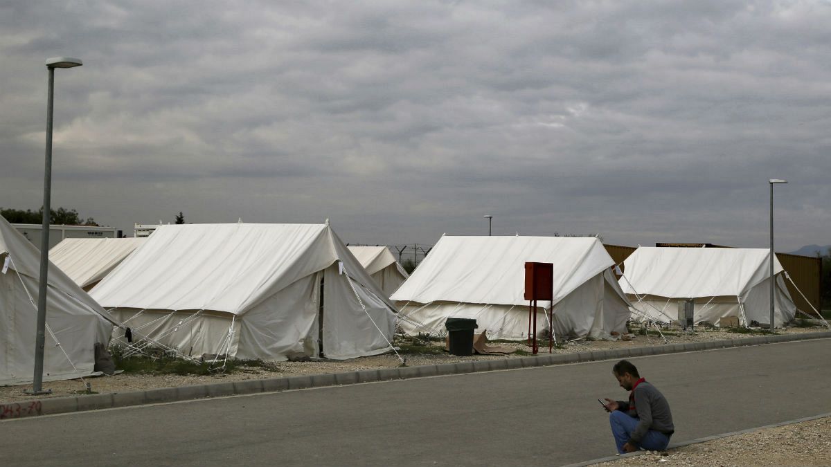 A migrant from Syria rests at a refugee camp in Kokkinotrimithia outside of Nicosia, Cyprus