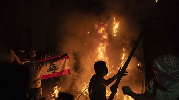 Anti-government protesters burn a barricade near the Parliament building, August 11 Anti-government protesters burn a barricade near the Parliament building, August 11