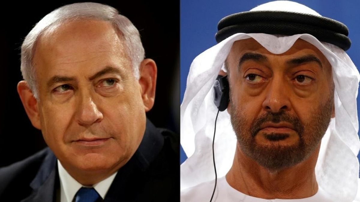 Israeli Prime Minister Benjamin Netanyahu (L) and Abu Dhabi's Crown Prince Mohammed bin Zayed 
