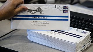 FILE - In this May 28, 2020, file photo, mail-in primary election ballots are processed at the Chester County Voter Services office in West Chester, Pa.