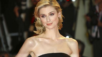 Actress Elizabeth Debicki poses for photographers at the premiere of 'The Burnt Orange Heresy' in Venice, Italy, Sept. 7, 2019