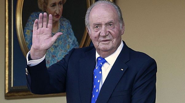 June 2, 2019 file photo, Spain's former King Juan Carlos waves during a bullfight at the bullring in Aranjuez, Madrid, Spain. June 2, 2019 file photo, Spain's former King Juan Carlos waves during a bullfight at the bullring in Aranjuez, Madrid, Spain.
