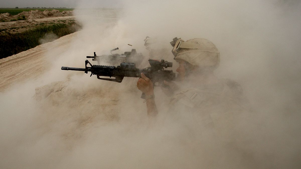 Afganistan'ın Helmand kentinde Taliban militanlarıyla savaşan ABD askerleri (arşiv)