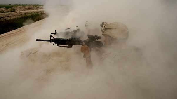 Afganistan'ın Helmand kentinde Taliban militanlarıyla savaşan ABD askerleri (arşiv) Afganistan'ın Helmand kentinde Taliban militanlarıyla savaşan ABD askerleri (arşiv)
