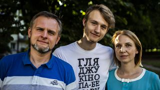 Andriy and Christina Vitushka with their son, Miron.