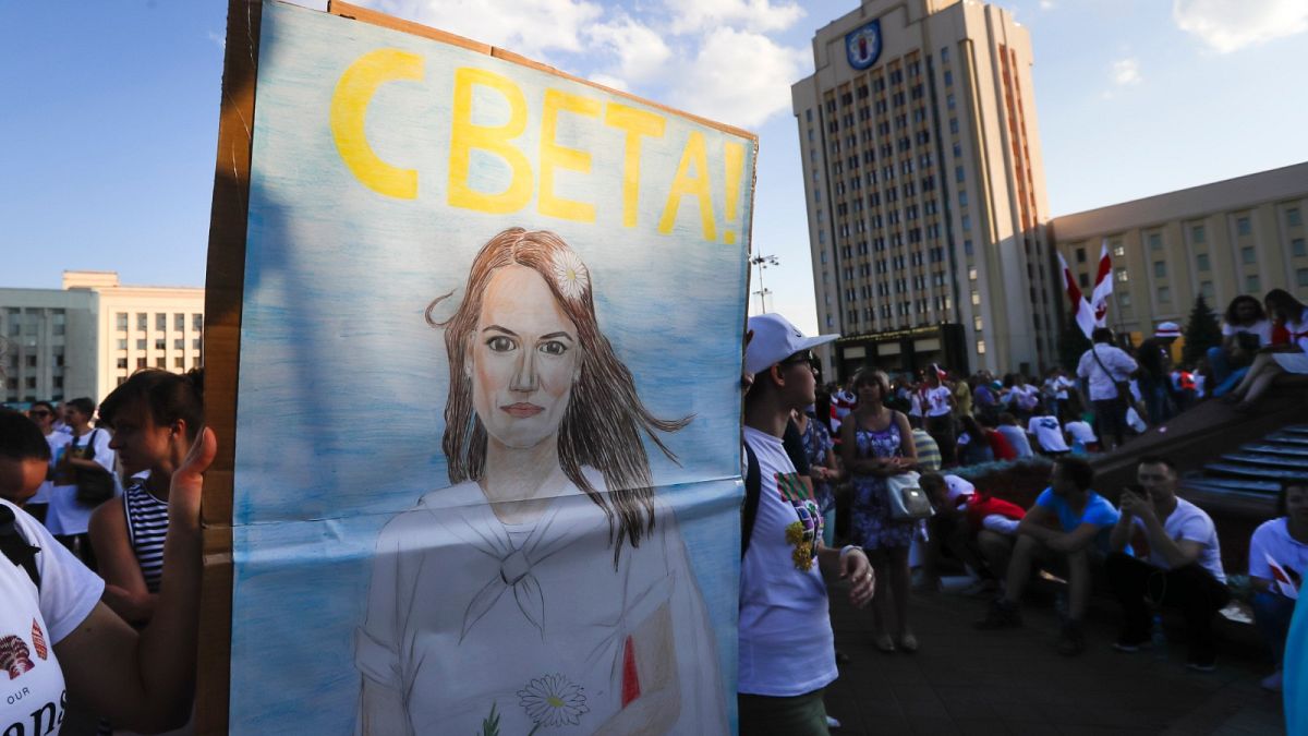 People carry a portrait of Sviatlana Tsikhanouskaya, former candidate for the presidential elections during an opposition rally. 