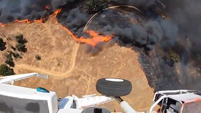 Helicopter dumps water on Malibu’s Rock Pool Fire