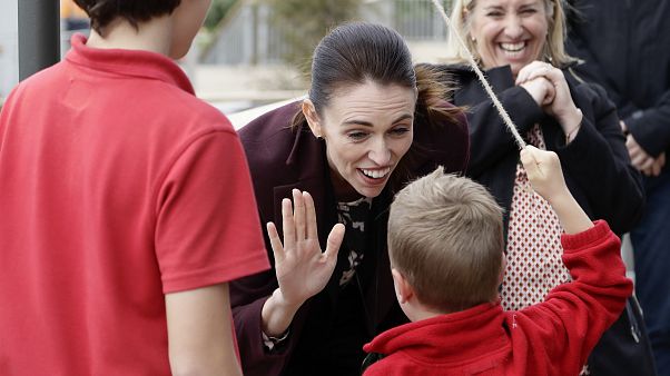 New Zealand Prime Minister Jacinda Ardern gestures with a student during the opening ceremony for Redcliffs School in Christchurch, New Zealand, Thursday, June 25, 2020 New Zealand Prime Minister Jacinda Ardern gestures with a student during the opening ceremony for Redcliffs School in Christchurch, New Zealand, Thursday, June 25, 2020