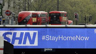 A sign above an underpass in London advises drivers to stay at home, as the country was in lockdown to help curb the spread of the coronavirus.