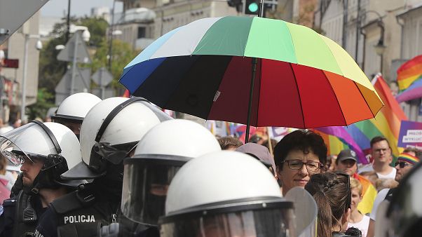 Police escort LGBT activists and their supporters during the first-ever pride parade in the central city of Plock, Poland, on Saturday Aug. 10, 2019. Police escort LGBT activists and their supporters during the first-ever pride parade in the central city of Plock, Poland, on Saturday Aug. 10, 2019.