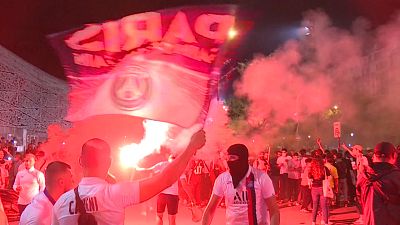 PSG fans celebrating outside Parc des Princes