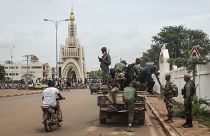 Security forces were pictured riding on trucks through the capital city, Bamako, on Tuesday.