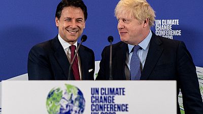 Britain's Prime Minister Boris Johnson (R) and Italy's Prime Minister Giuseppe Conte shakes hands during an event to launch the United Nations' Climate Change conference. Britain's Prime Minister Boris Johnson (R) and Italy's Prime Minister Giuseppe Conte shakes hands during an event to launch the United Nations' Climate Change conference.