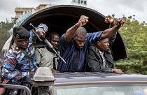 Security forces and others in celebration drive through the streets of the capital Bamako, Mali, Wednesday, Aug. 19, 2020