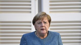 German Chancellor Angela Merkel speaks during a press conference with French President Emmanuel Macron at the Fort de Bregancon, southern France, Thursday, Aug. 20, 2020