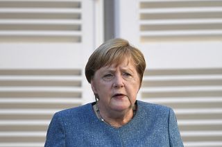 German Chancellor Angela Merkel speaks during a press conference with French President Emmanuel Macron at the Fort de Bregancon, southern France, Thursday, Aug. 20, 2020