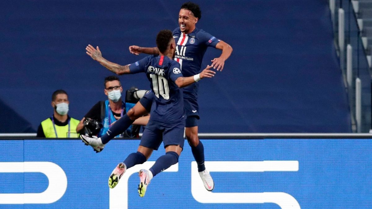 PSG's Marquinhos, right, celebrates with Neymar after scoring the opening goal during the Champions League semifinal VS Leipzig on August 18, 2020