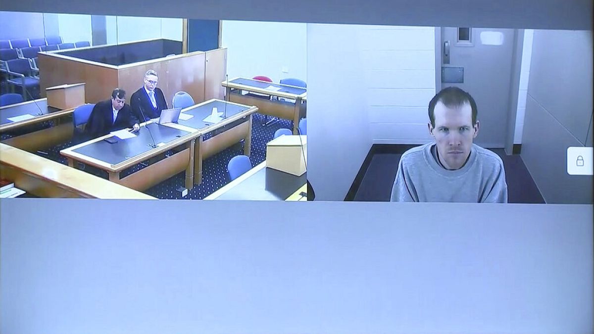 This image made from a video, shows Brenton Harrison Tarrant, right, and lawyers in a screen via video link in Christchurch, New Zealand, March 26, 2020.