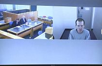 This image made from a video, shows Brenton Harrison Tarrant, right, and lawyers in a screen via video link in Christchurch, New Zealand, March 26, 2020.