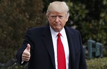 President Donald Trump waves as he walks from White House in Washington, Friday, Feb. 3, 2017