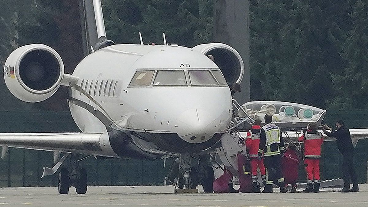 A stretcher is taken from special aircraft with the Kremlin critic Alexei Navalny on board at Tegel Airport in Berlin.