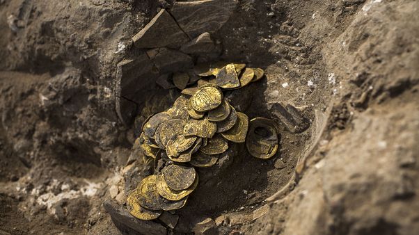 A hoard of gold coins discovered at an archeological site in central Israel. A hoard of gold coins discovered at an archeological site in central Israel.