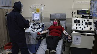 A survivor of the new coronavirus donates her plasma containing COVID-19 antibodies in Bolivia