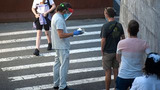 People queue to be tested for coronavirus in Guernica