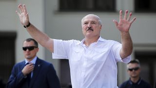  Belarusian President Alexander Lukashenko gestures as he greets supporters at Independence Square in Minsk, Belarus. August 16, 2020