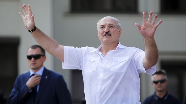 Belarusian President Alexander Lukashenko gestures as he greets supporters at Independence Square in Minsk, Belarus. August 16, 2020 Belarusian President Alexander Lukashenko gestures as he greets supporters at Independence Square in Minsk, Belarus. August 16, 2020