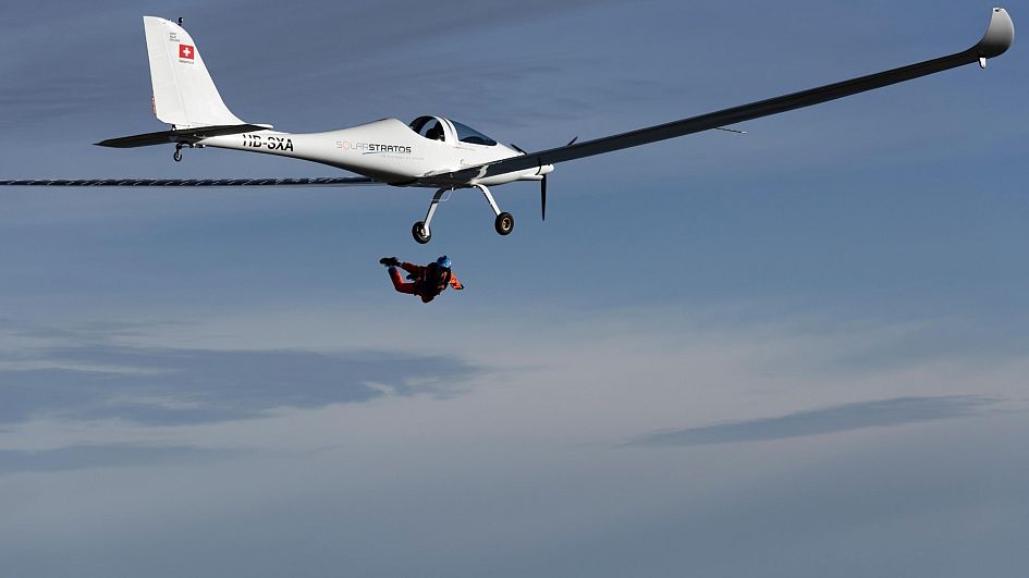 Watch Swiss skydiver make first ever jump from solar-powered plane