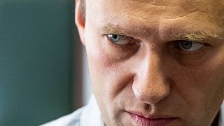 In this Wednesday, Sept. 5, 2018 file photo Russian opposition leader Alexei Navalny pictured at a hearing in Moscow, Russia