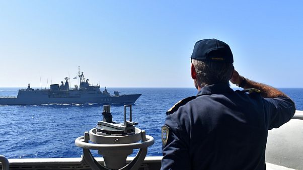 Photo provided by the Greek Defence Ministry, shows warships taking part in a military exercise in Eastern Mediterranean sea, Tuesday, Aug. 25, 2020. Photo provided by the Greek Defence Ministry, shows warships taking part in a military exercise in Eastern Mediterranean sea, Tuesday, Aug. 25, 2020.