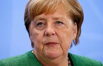 German Chancellor Angela Merkel addresses the media in Berlin on August 27, 2020