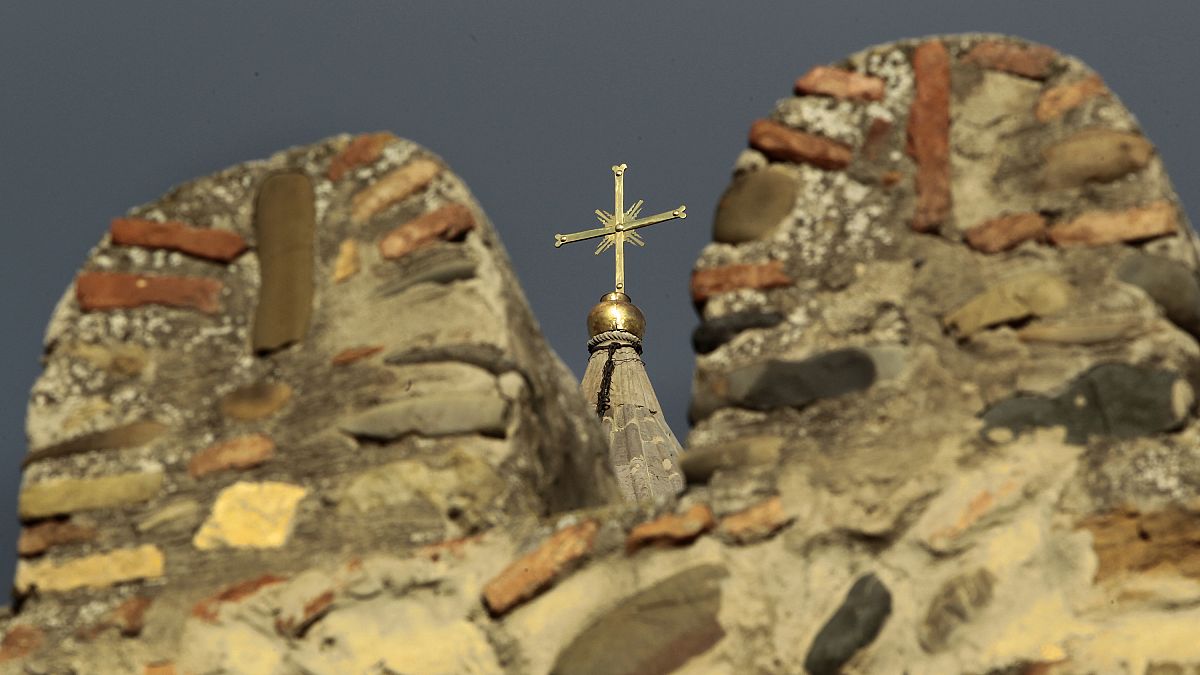 The cross on top of the Svetitskhoveli Orthodox cathedral in Mtskheta, Georgia