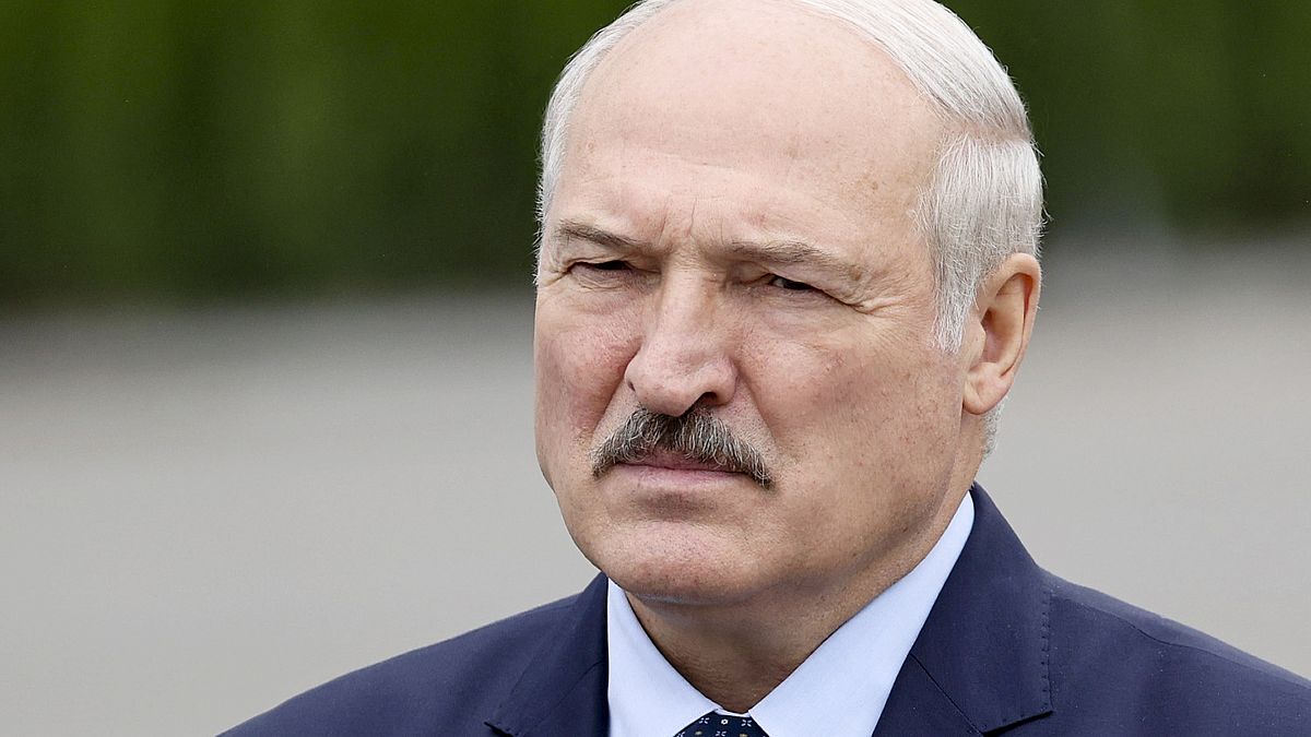 Belarusian President Alexander Lukashenko gestures while addressing employees of the Orsha dairy plant in Orsha, Belarus, Friday, Aug. 28, 2020