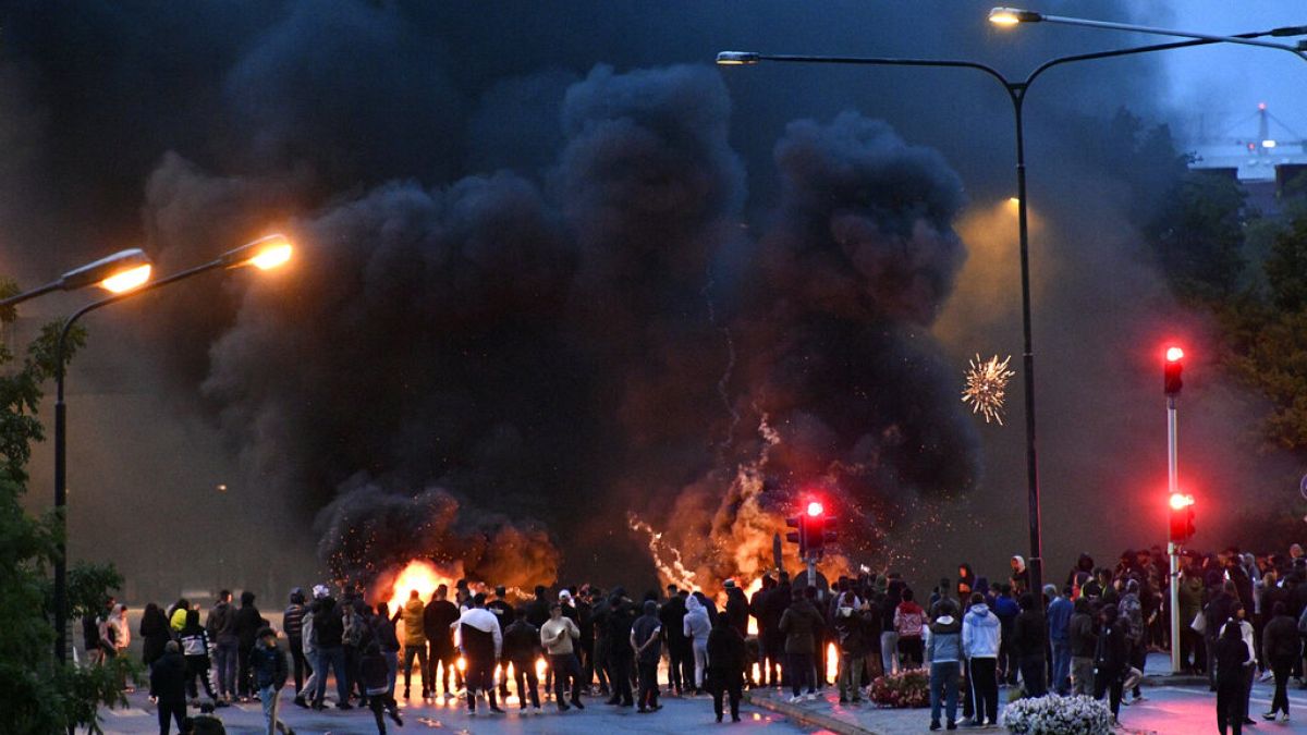 Several hundred protesters riot in the Rosengard neighbourhood of Malmo, Sweden, Friday, Aug. 28, 2020.
