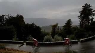 Socially-distanced spectators watch the Tour de France start from Nice