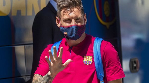 In this Aug. 13, 2020 file photo, Barcelona's Lionel Messi waves as he arrives at the team hotel in Lisbon, Portugal. In this Aug. 13, 2020 file photo, Barcelona's Lionel Messi waves as he arrives at the team hotel in Lisbon, Portugal.