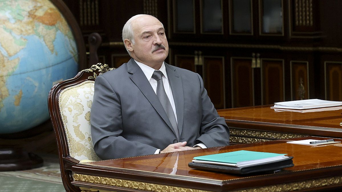 Belarusian President Alexander Lukashenko listens to Valiantsin Sukala, head of the Supreme Court of Belarus during their meeting in Minsk, Belarus, Monday, Aug. 31, 2020.