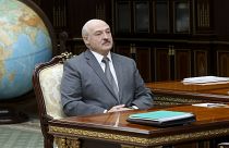 Belarusian President Alexander Lukashenko listens to Valiantsin Sukala, head of the Supreme Court of Belarus during their meeting in Minsk, Belarus, Monday, Aug. 31, 2020.