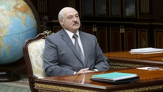 Belarusian President Alexander Lukashenko listens to Valiantsin Sukala, head of the Supreme Court of Belarus during their meeting in Minsk, Belarus, Monday, Aug. 31, 2020.