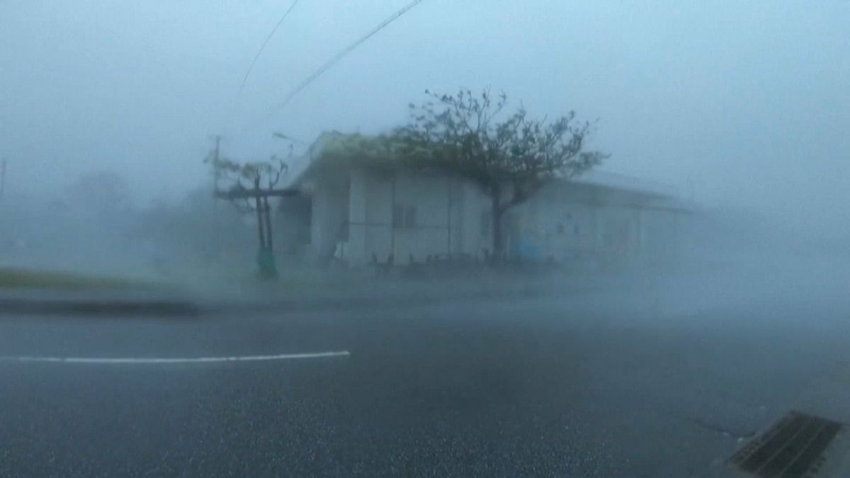 Typhoon Maysak sweeps over southern Japan