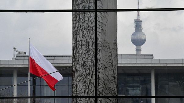 FILE - The Polish flag flies outside the German Chancellery in Berlin, 2018. FILE - The Polish flag flies outside the German Chancellery in Berlin, 2018.