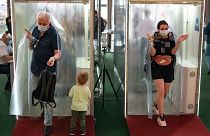 Passages equipped with disinfectant sprays at a shopping mall entrance in Moscow, Russia