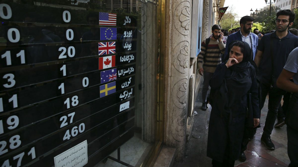 An exchange shop displays rates for various currencies, in downtown Tehran, Iran